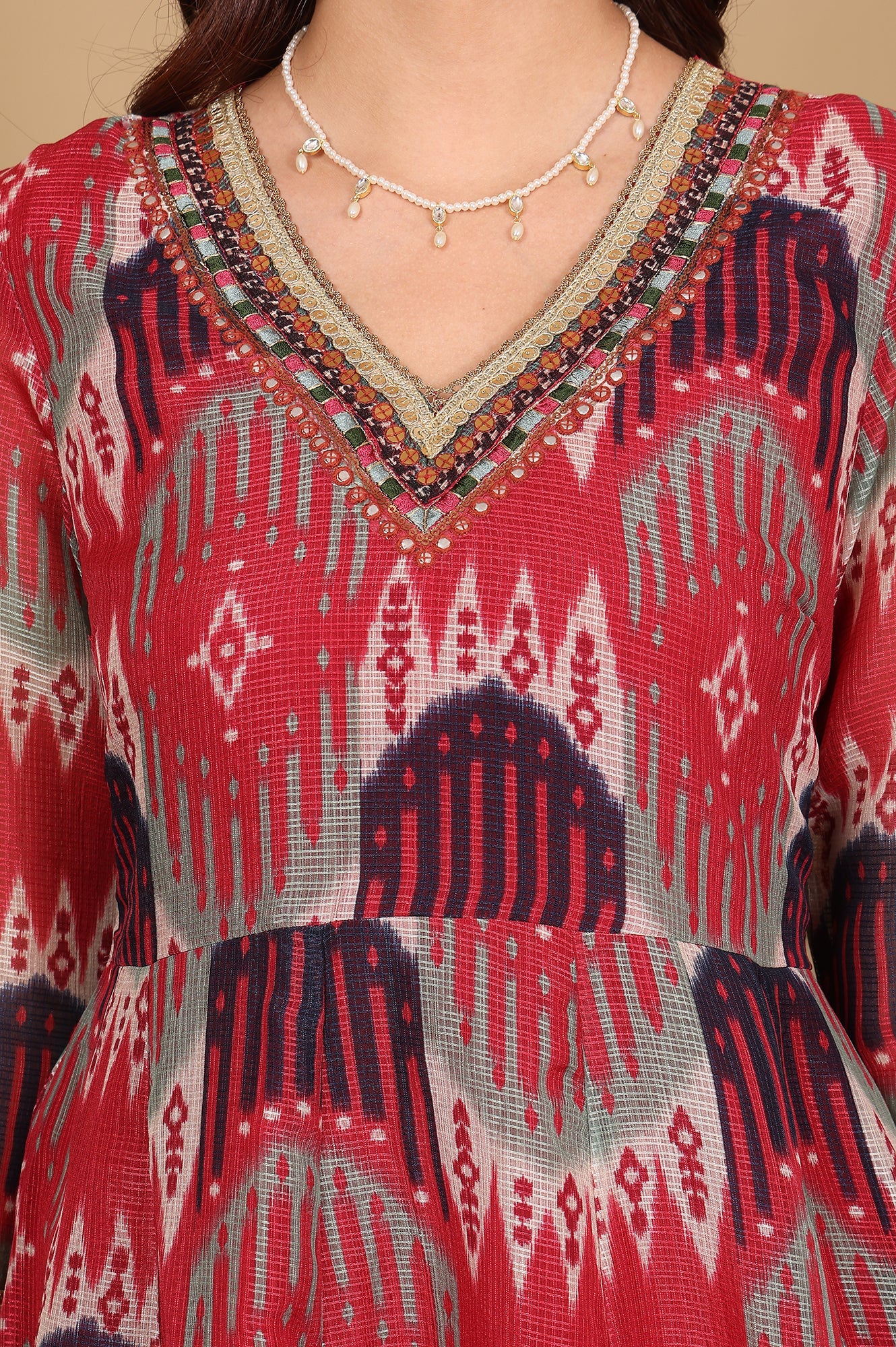 Women’s Flared Dress in Red and Multi-Coloured Ikkat Print with Thread Detailing and Mirror Work – Graceful Ethnic Ensemble for Weddings and Festivals
