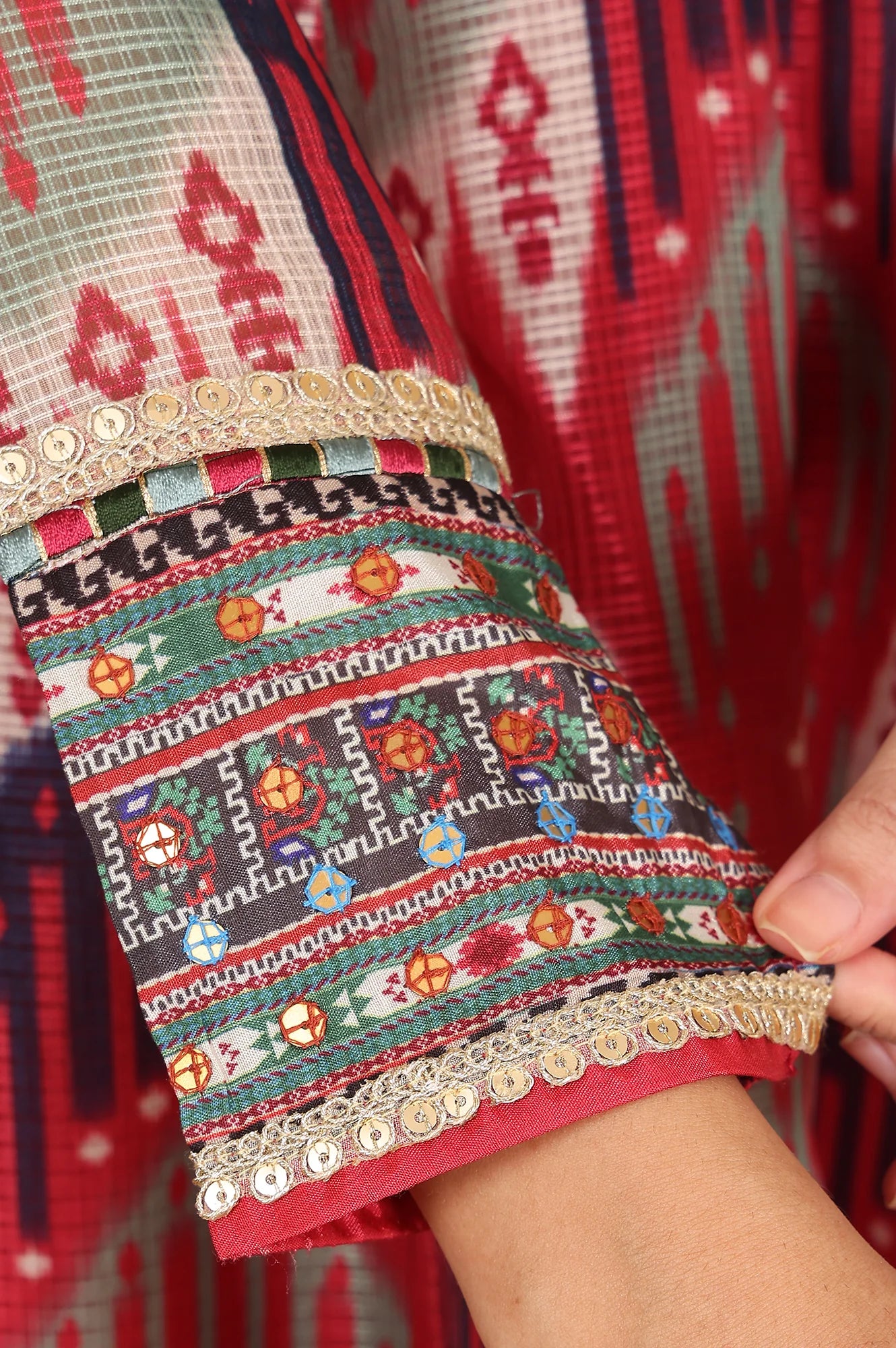 Women’s Flared Dress in Red and Multi-Coloured Ikkat Print with Thread Detailing and Mirror Work – Graceful Ethnic Ensemble for Weddings and Festivals