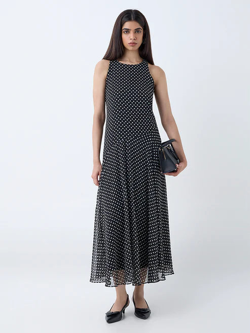 Chic Black Polka Dot Drop-Waist Dress with Feminine Silhouette