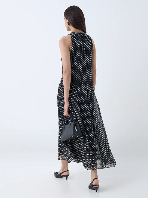 Chic Black Polka Dot Drop-Waist Dress with Feminine Silhouette