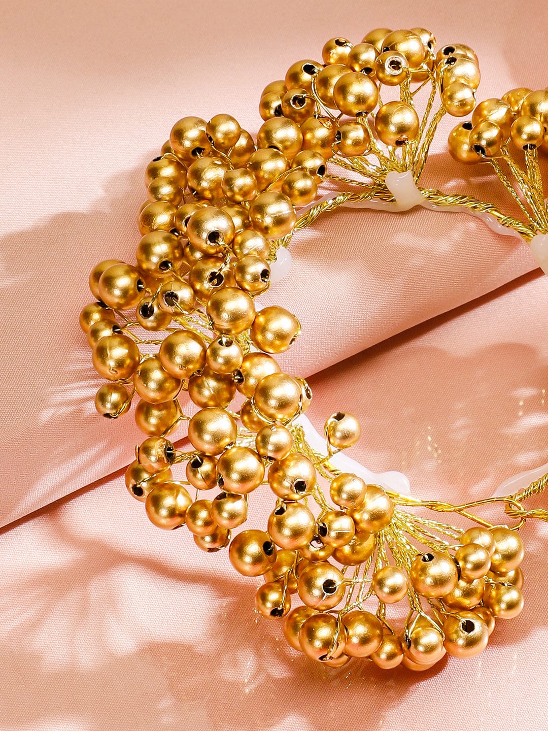 Modern Gold Toned Hair Bun Accessory with Decorative Pearl Details